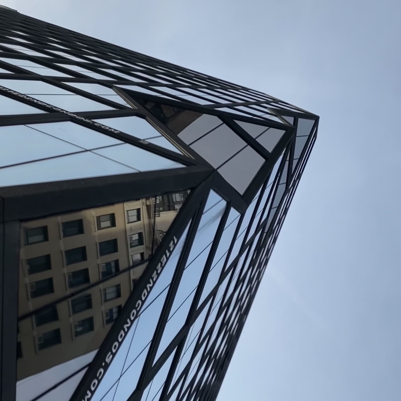 A building leaning in like it has gossip